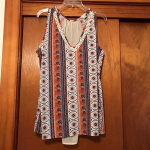 Never worn. Fun tank.